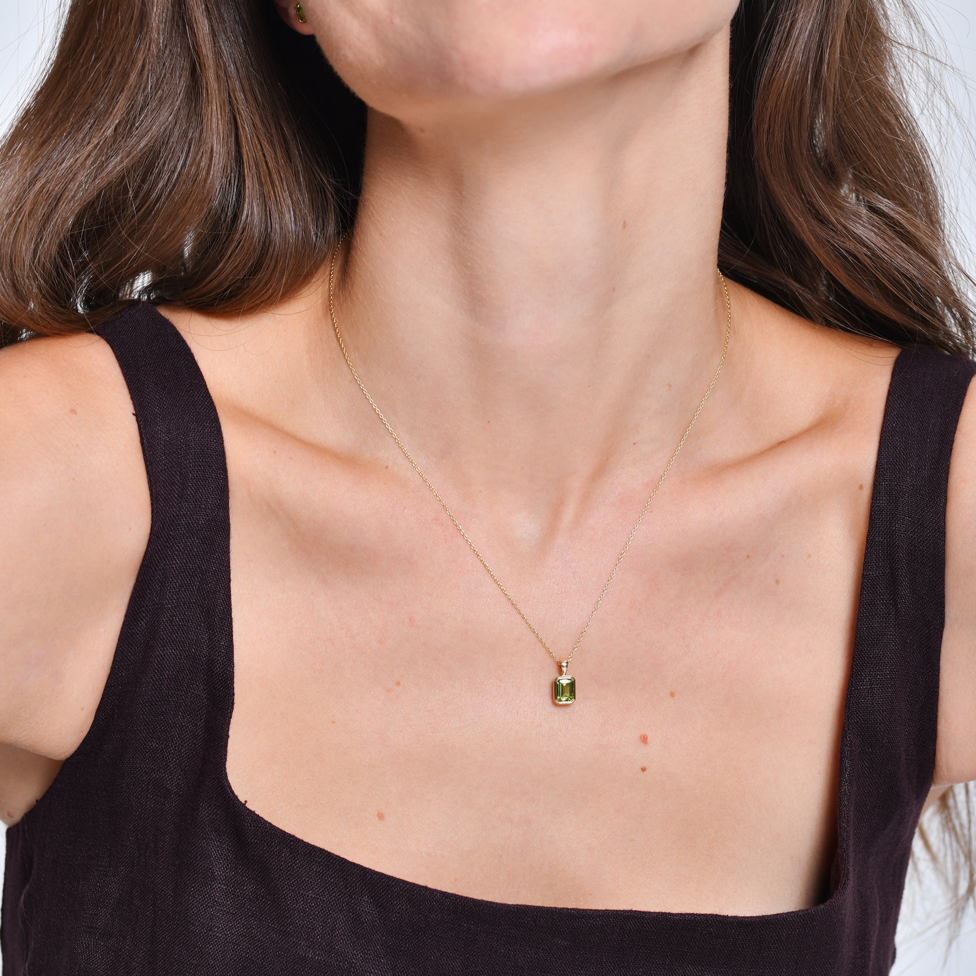 Emerald Cut Peridot Vertical Bezel Setting Pendant