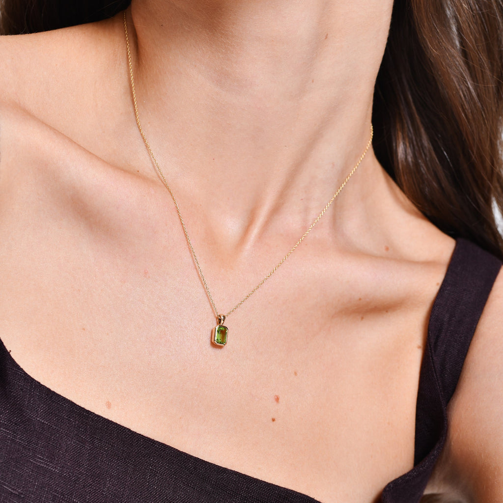 Emerald Cut Peridot Vertical Bezel Setting Pendant