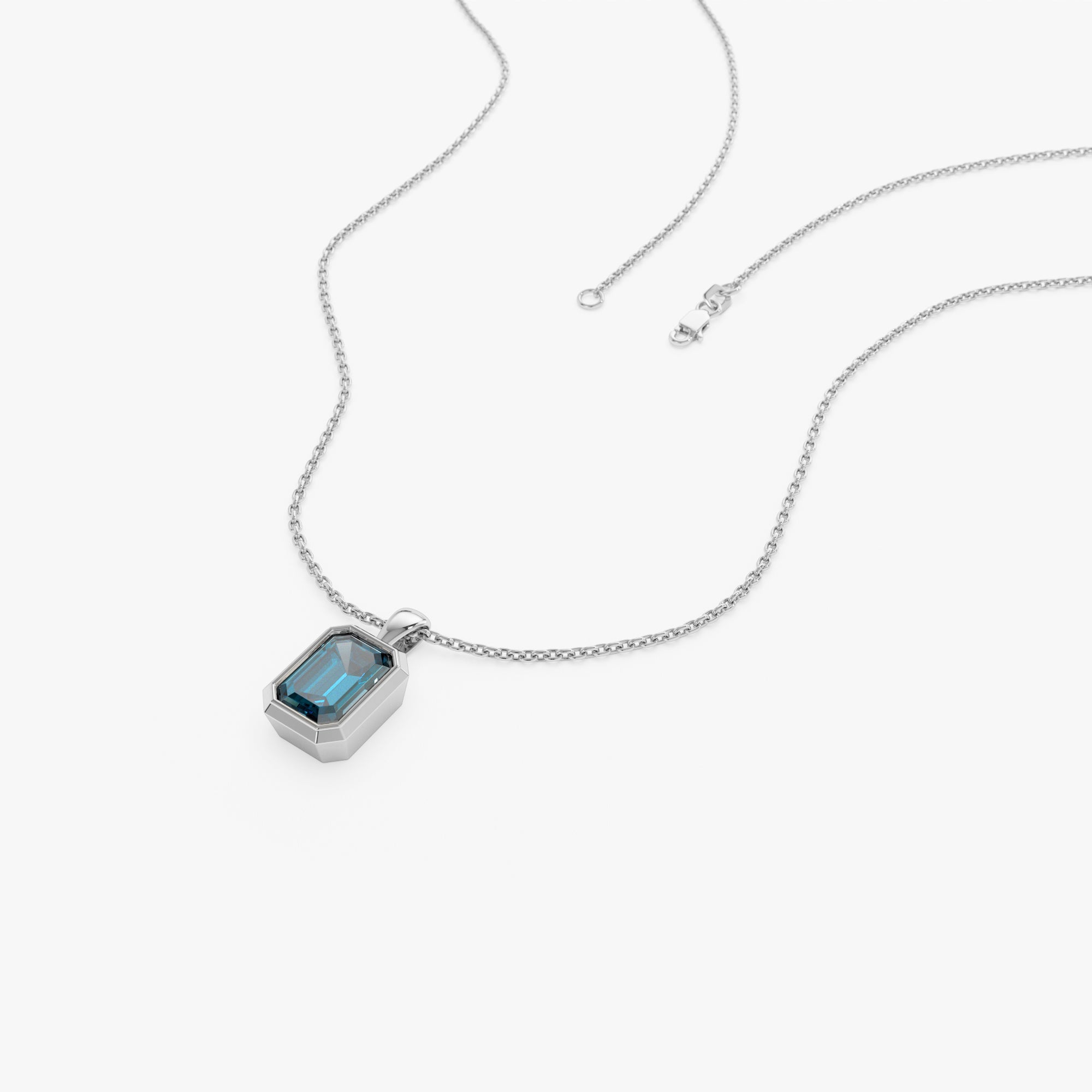 Emerald Cut London Blue Topaz Vertical Bezel Setting Pendant