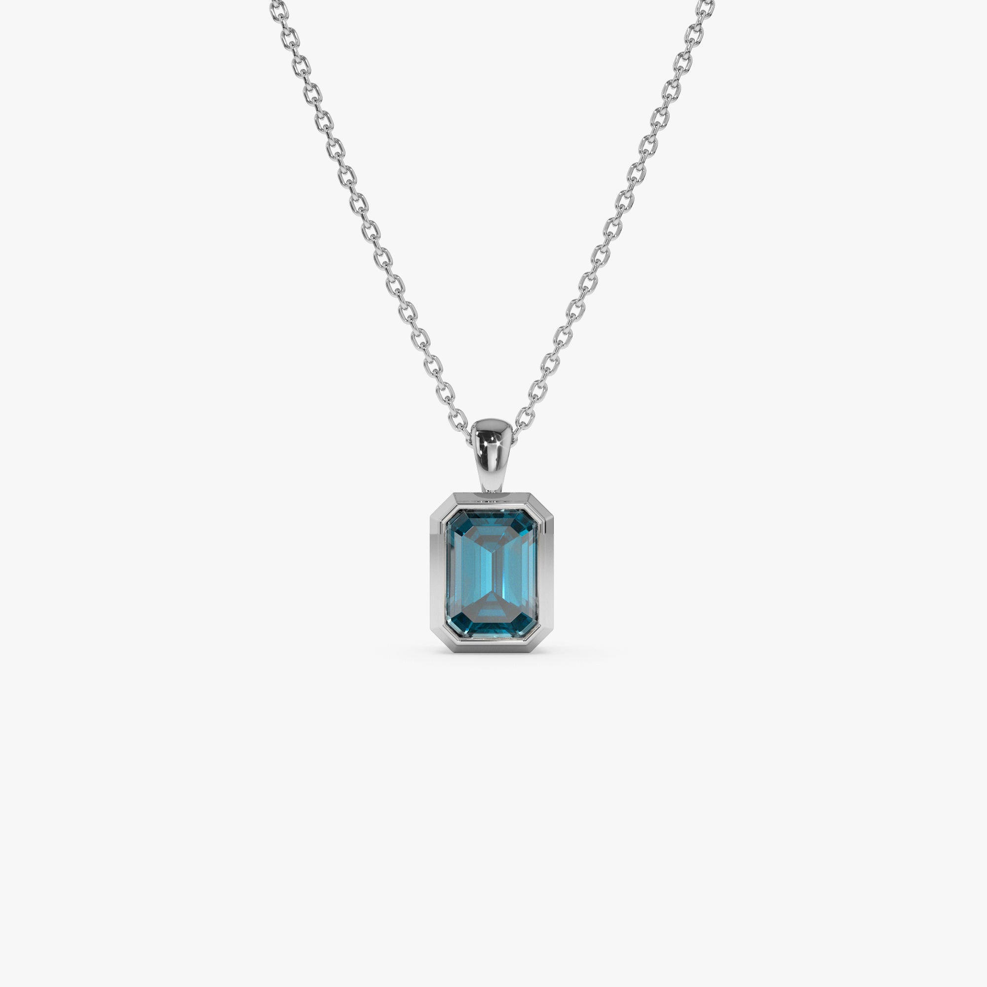 Emerald Cut London Blue Topaz Vertical Bezel Setting Pendant