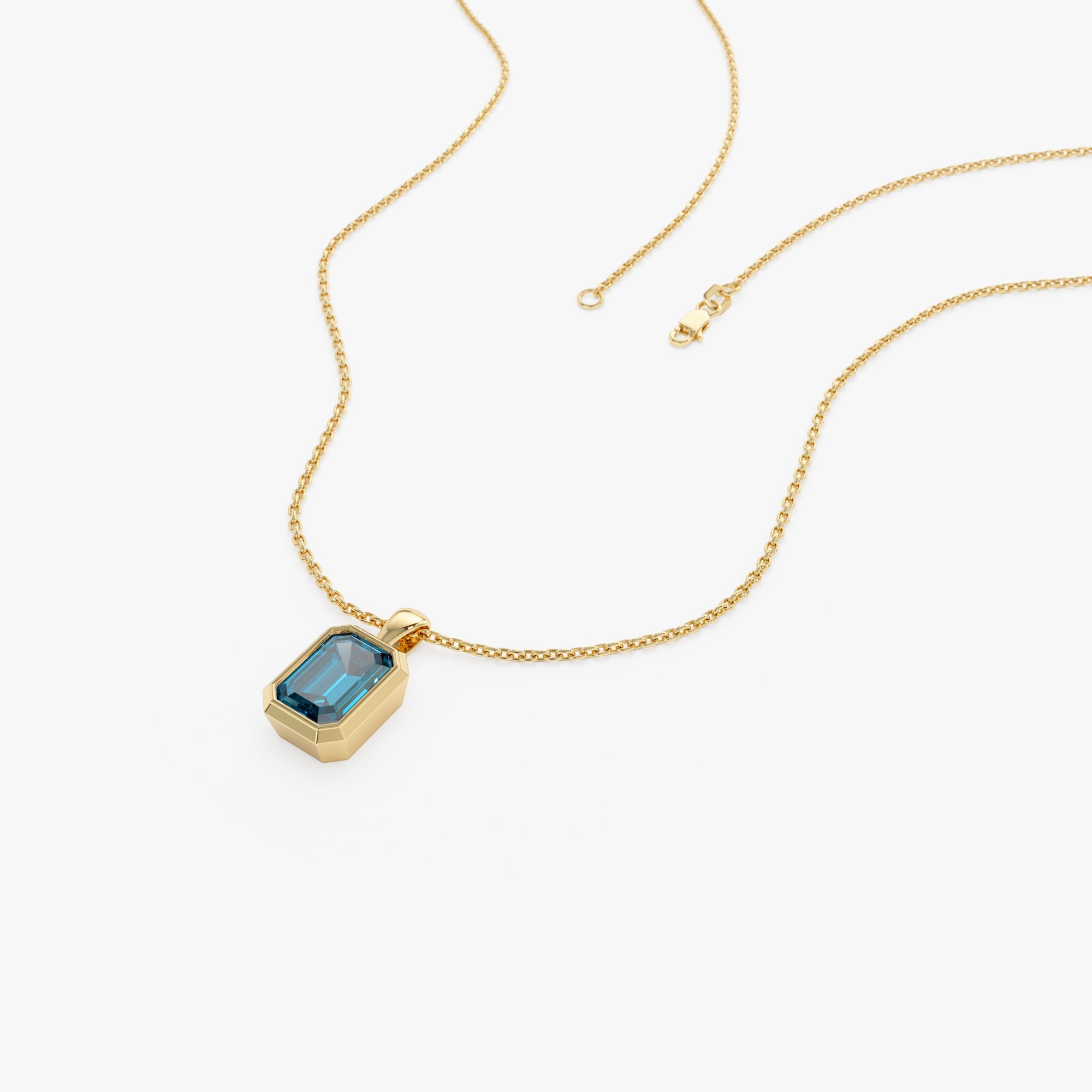 Emerald Cut London Blue Topaz Vertical Bezel Setting Pendant
