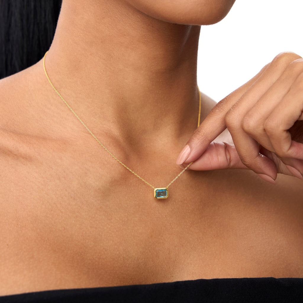 Emerald Cut Bezel Setting Blue Topaz